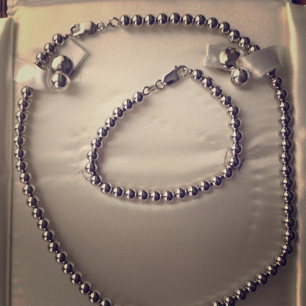 Sterling Silver bead set.